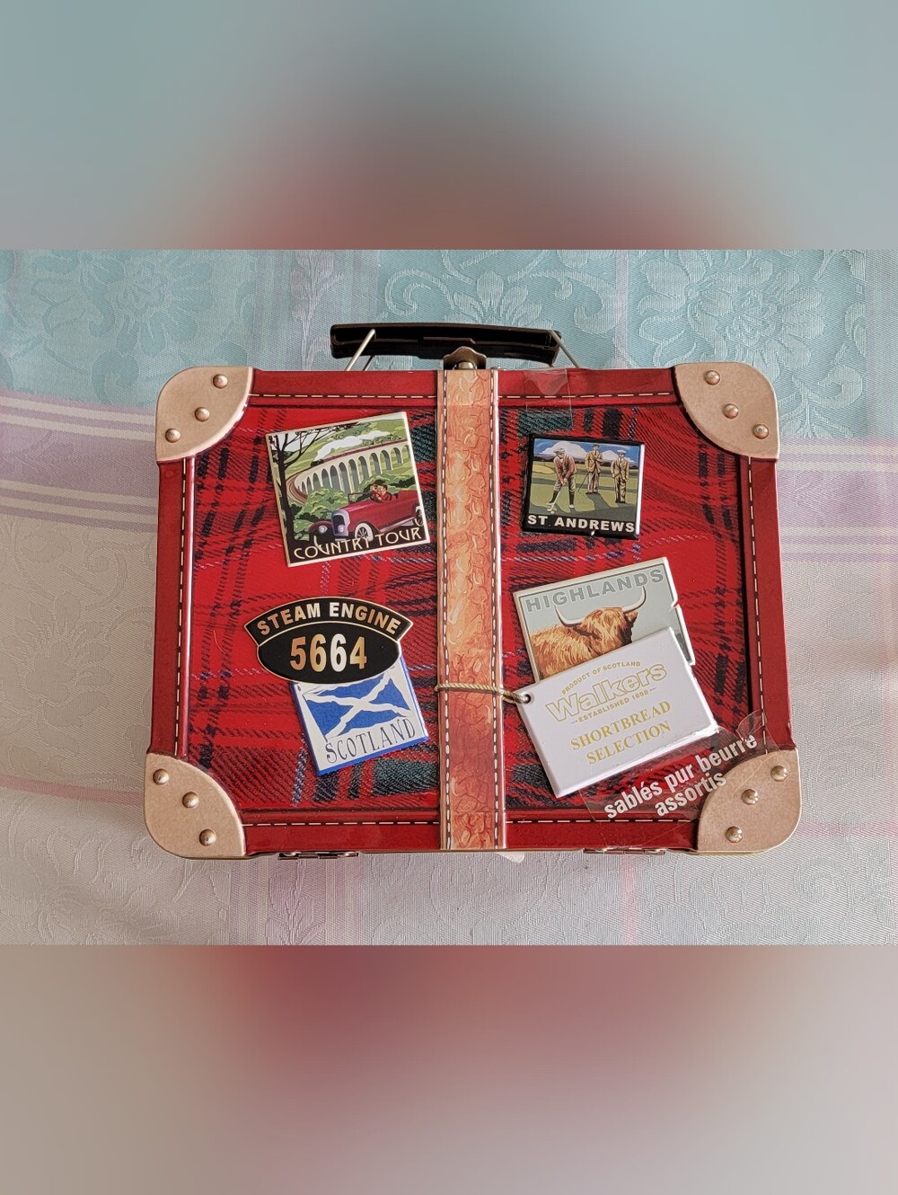 Walkers Shortbread tin designed to look like a vintage travel suitcase
